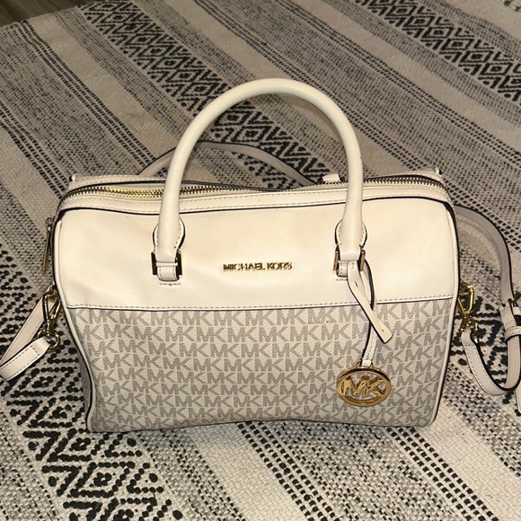 Michael Kors Handbags - Michael Kors Monogram White and Cream duffel crossbody